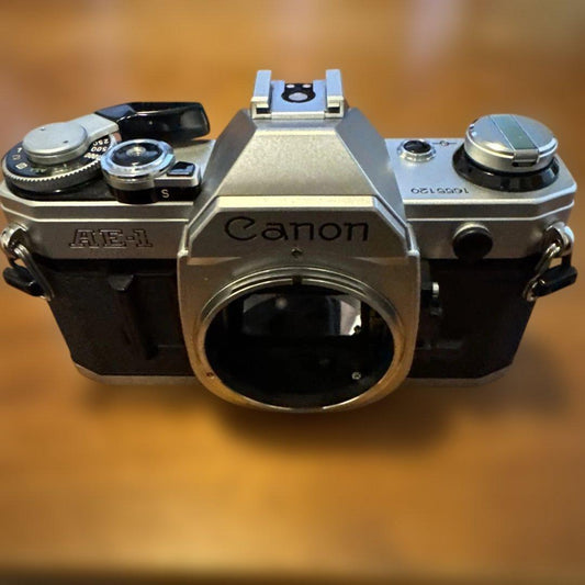 Used Canon AE-1 Silver 35mm SLR Film Camera Body Built-in Light Meter FD Mount Shutter Works Junk For Parts or Repair Vintage Photo